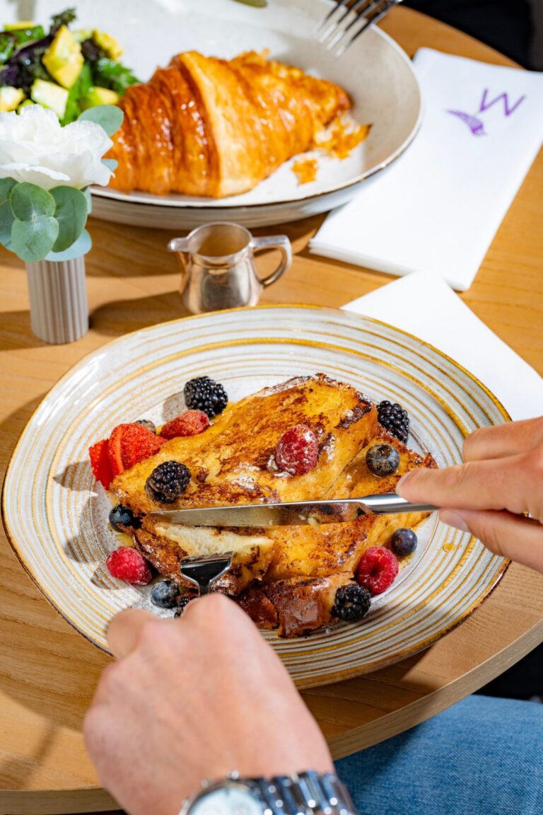French toast with fresh berries and a croissant