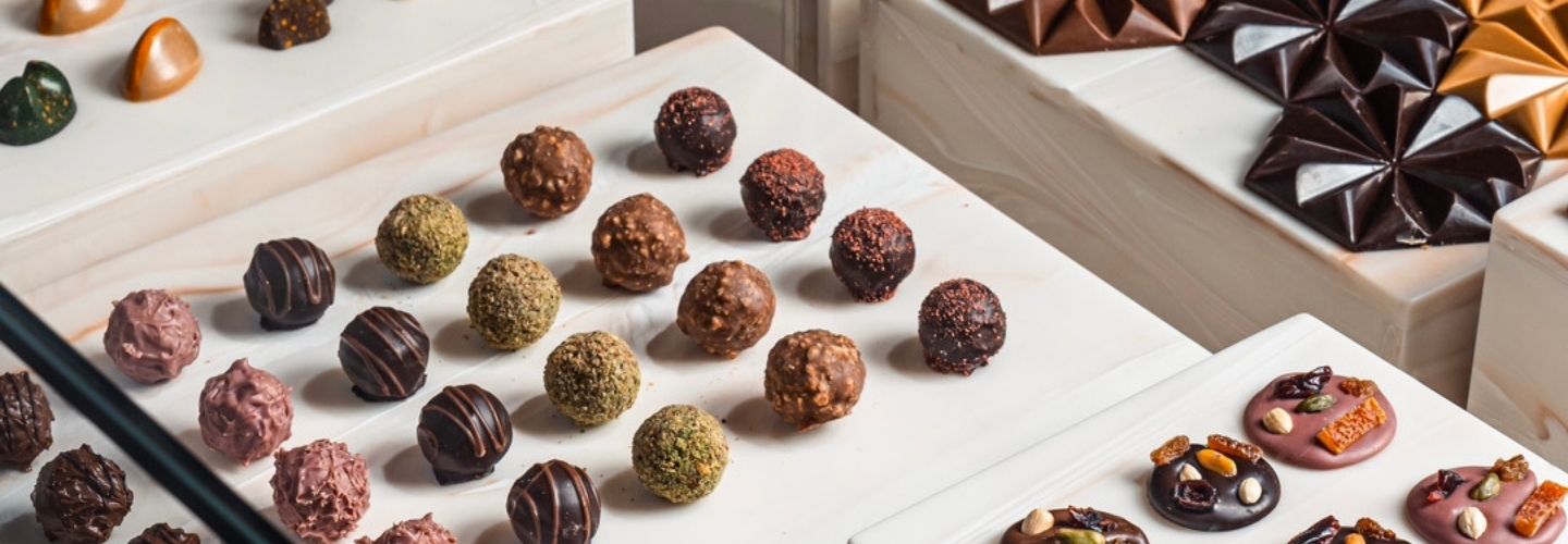 Praline chocolates on a marble display